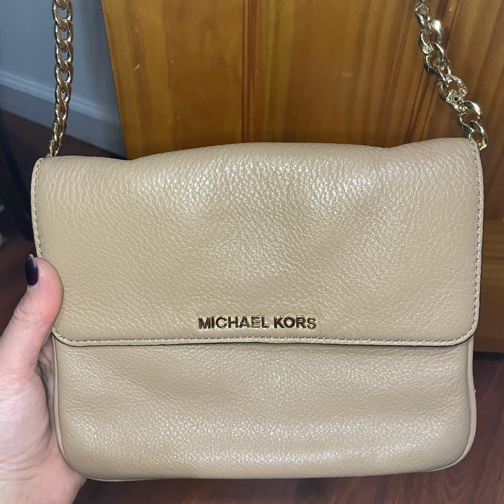 Tan cross body Michael Kor’s satchel